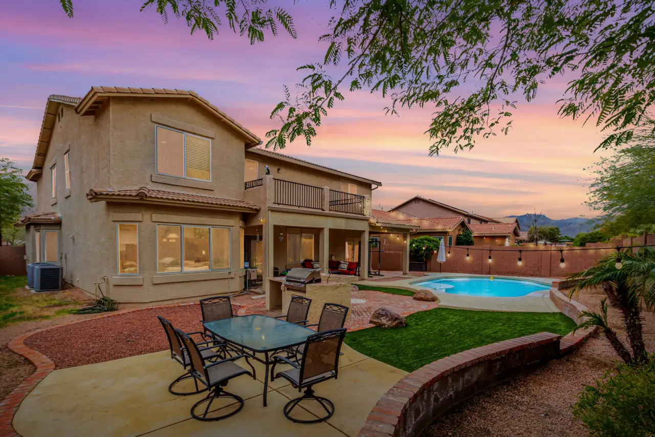 Arizona backyard with a pool at sunset